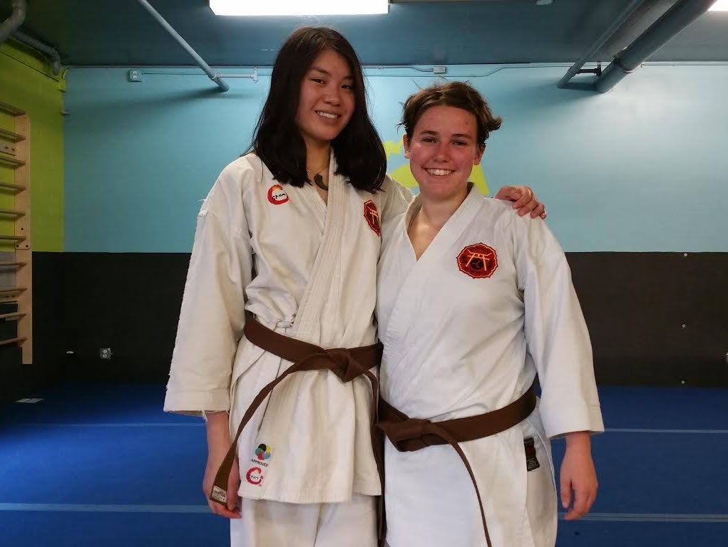 Two students in uniform after class