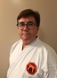 Ken Lerseth in a white karate gi